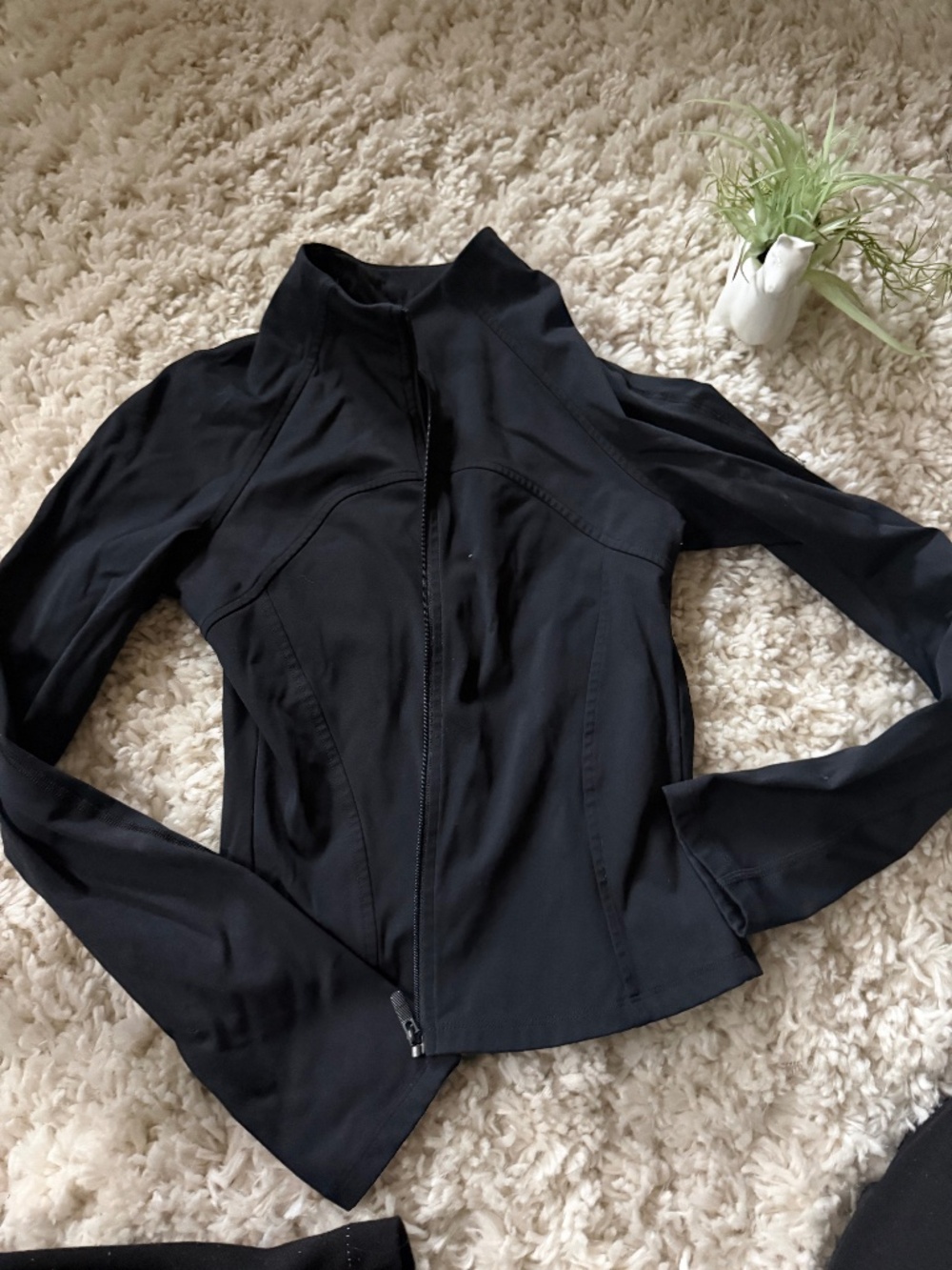 A tailored black Classic Black Women's sporty athletic gym workout sleek Jacket